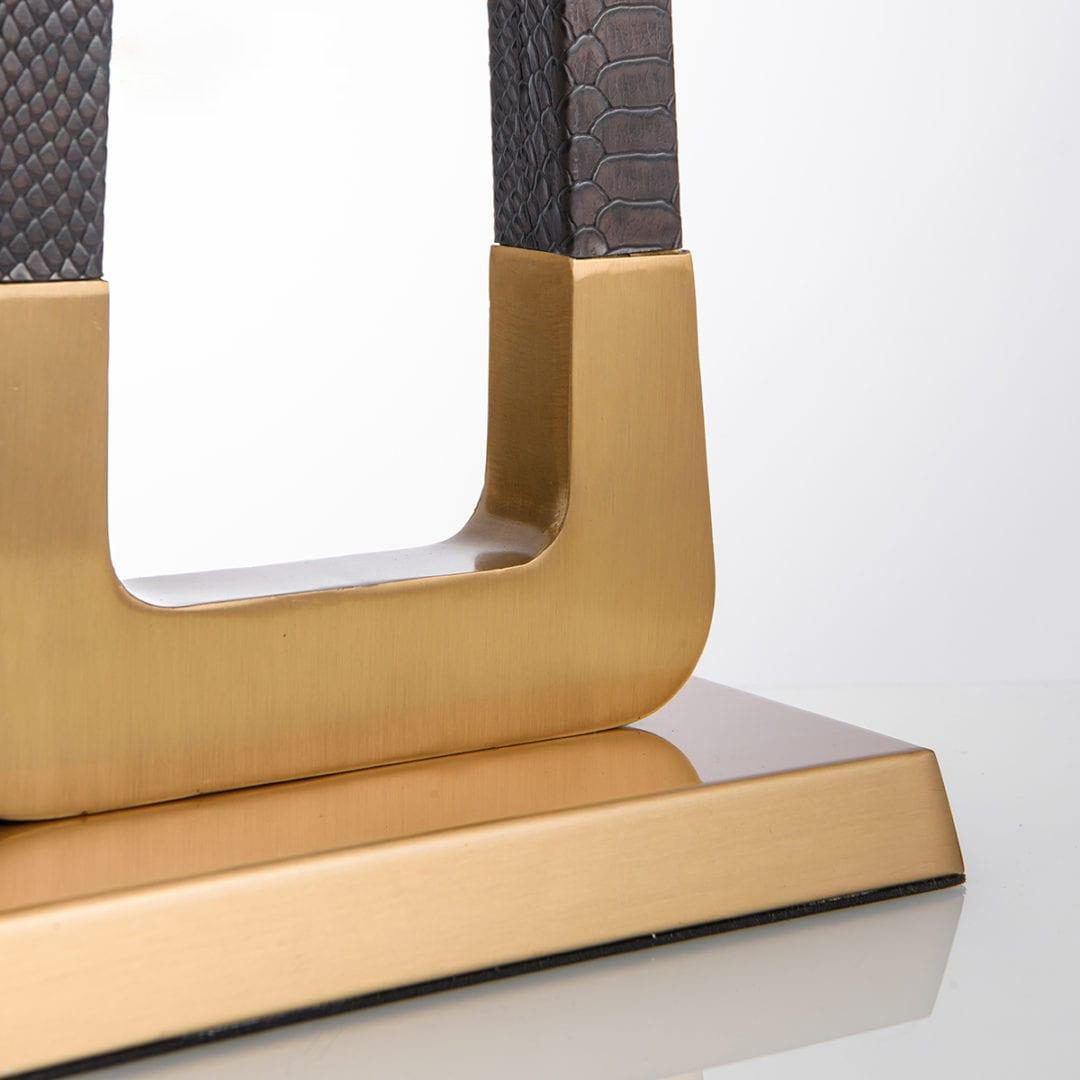 elegant-leather-texture-table-lamp-with-gold-metal-base-and-linen-shade