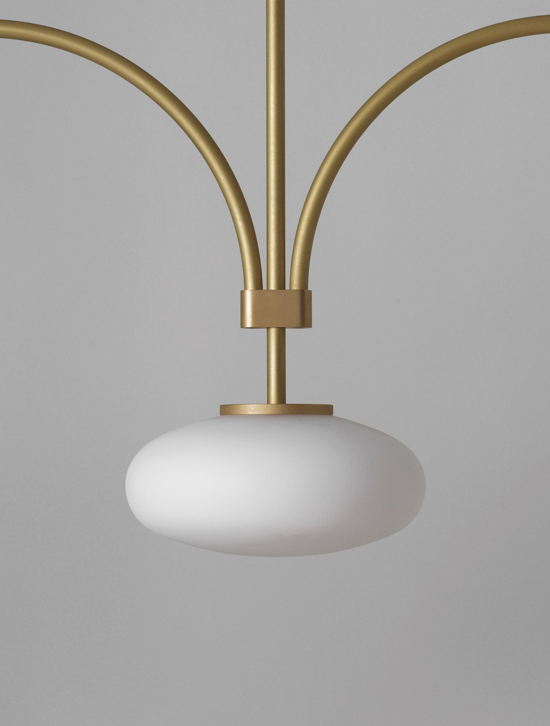 mid-century-modern-looping-brass-pendant-light-with-white-blown-glass-globes