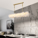 modern-brass-and-natural-white-alabaster-led-chandelier-for-luxury-dining-spaces