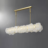 modern-brass-and-natural-white-alabaster-led-chandelier-for-luxury-dining-spaces