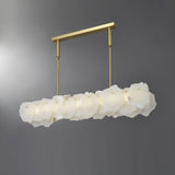 modern-brass-and-natural-white-alabaster-led-chandelier-for-luxury-dining-spaces
