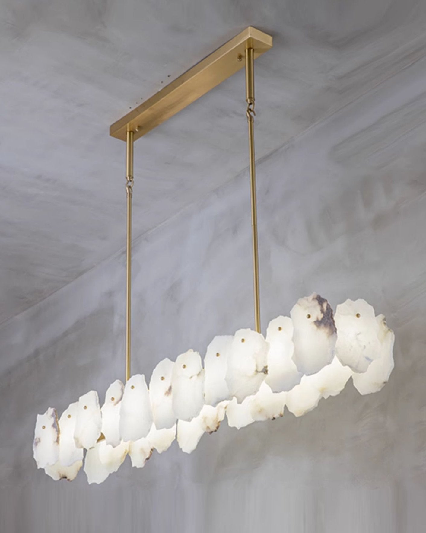 modern-brass-and-natural-white-alabaster-led-chandelier-for-luxury-dining-spaces