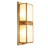 modern-brass-wall-sconce-lighting-with-elegant-handcrafted-glass-shade