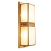 modern-brass-wall-sconce-lighting-with-elegant-handcrafted-glass-shade