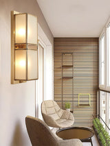 modern-brass-wall-sconce-lighting-with-elegant-handcrafted-glass-shade