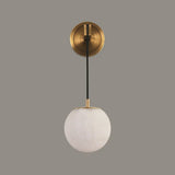 modern-alabaster-globe-wall-sconce-with-brass-accents-elegant-spherical-indoor-light