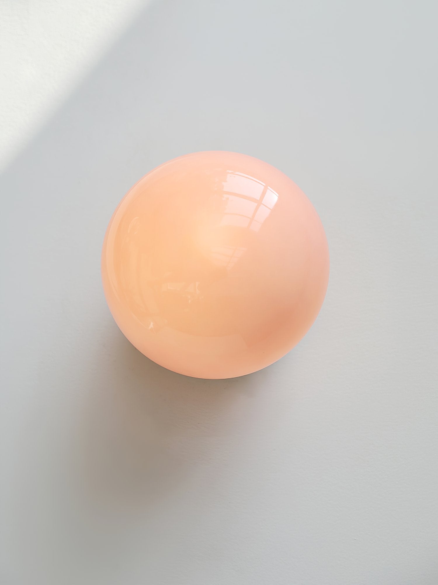 elegant-pink-glass-marshmallow-wall-sconce-for-modern-home-interior-lighting
