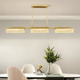 modern-gold-brass-pendant-light-with-resin-shades-and-three-color-led-light