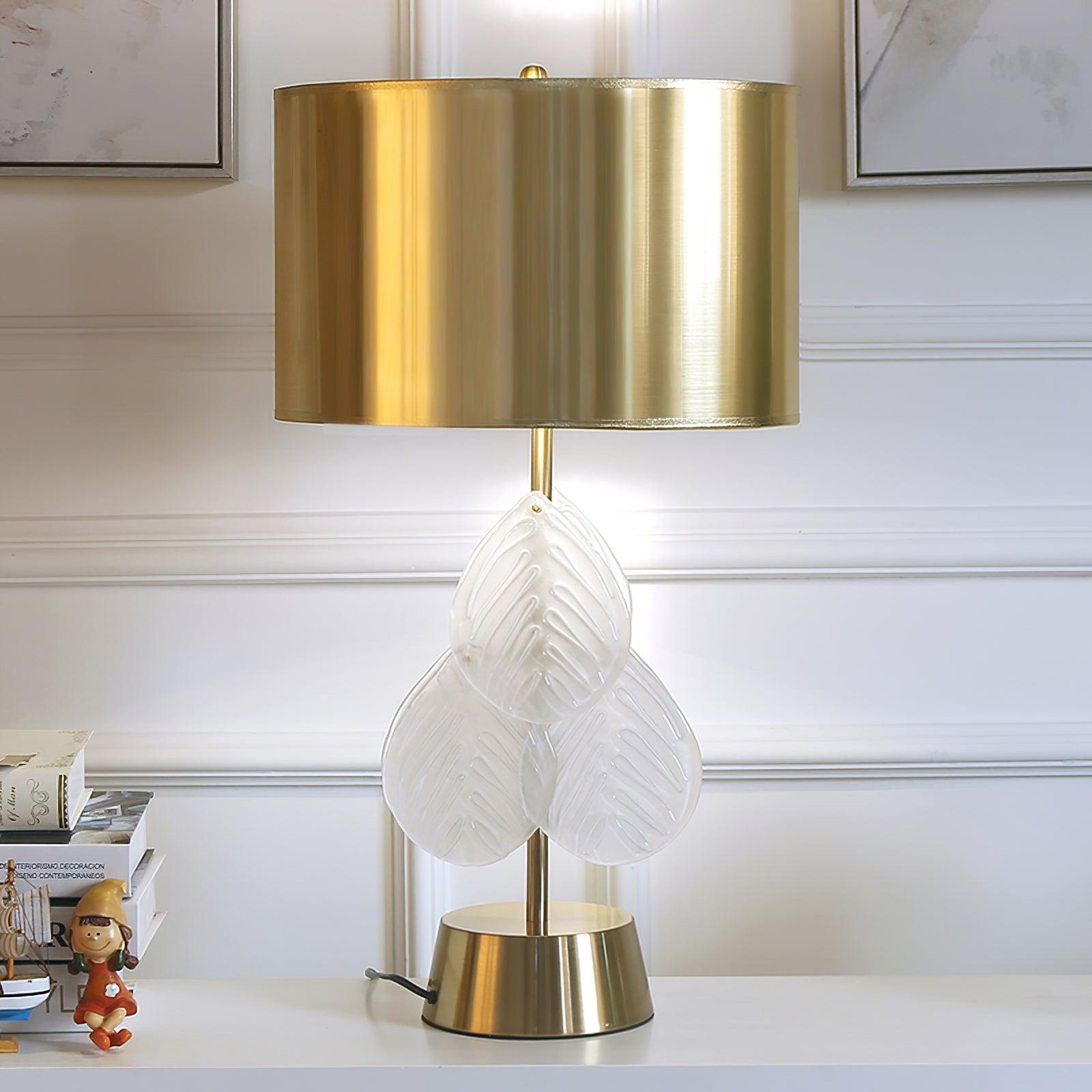 Modern Antique Gold Table Lamp with Clear Glass Leaf Accents and Fabric Drum Shade