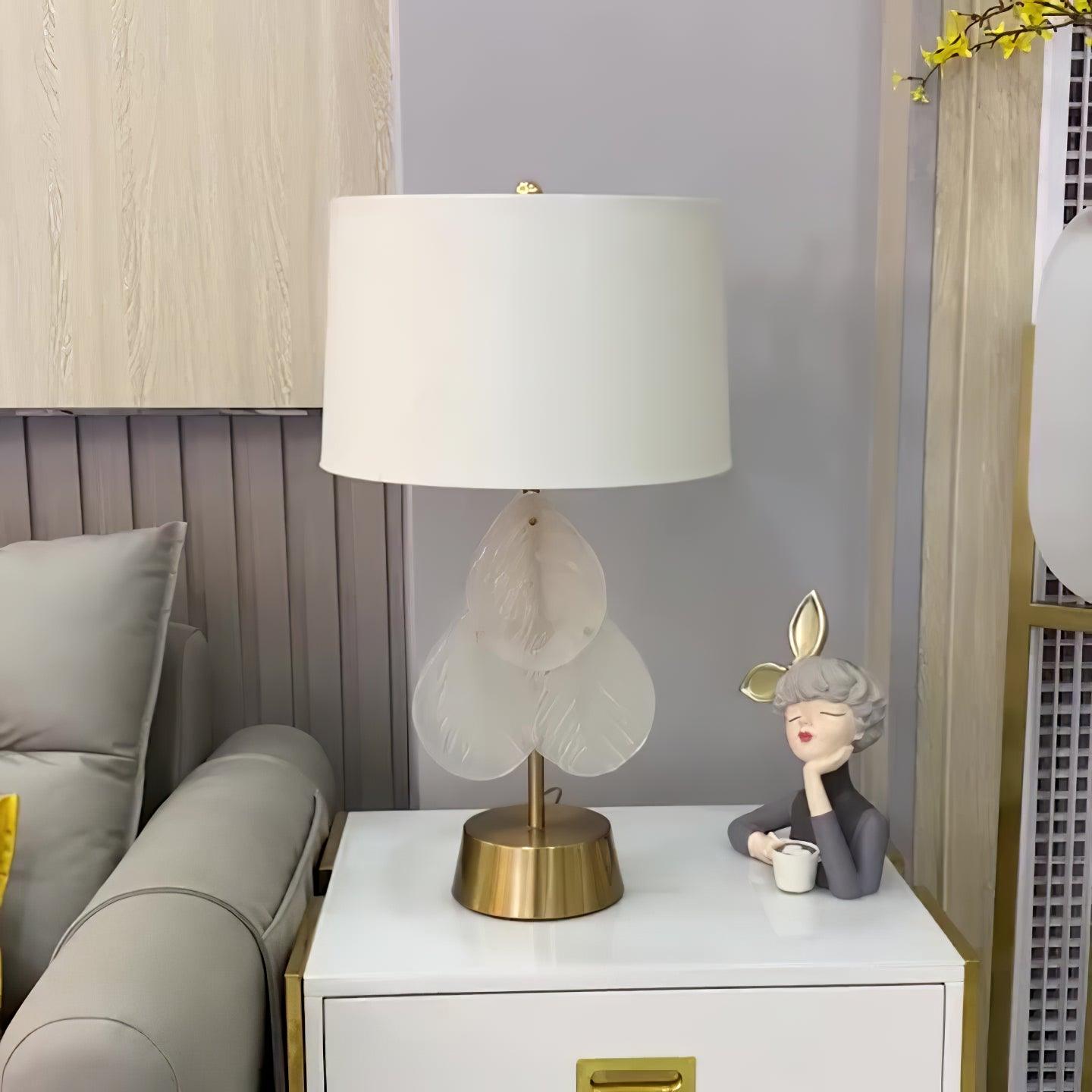 Modern Antique Gold Table Lamp with Clear Glass Leaf Accents and Fabric Drum Shade