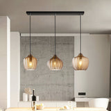 modern-ribbed-glass-pendant-light-with-melon-shade-for-dining-room