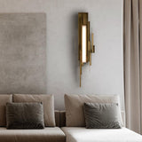 modern-brutalist-gold-metal-sculpted-wall-sconce-integrated-led-vertical-light-fixture