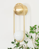 modern-mila-glass-globe-wall-sconce-brass-minimalist-interior-lighting-fixture