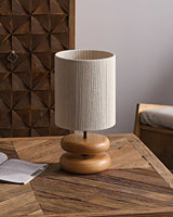 polished-walnut-stacked-oval-base-table-lamp-with-classic-beige-fabric-lampshade