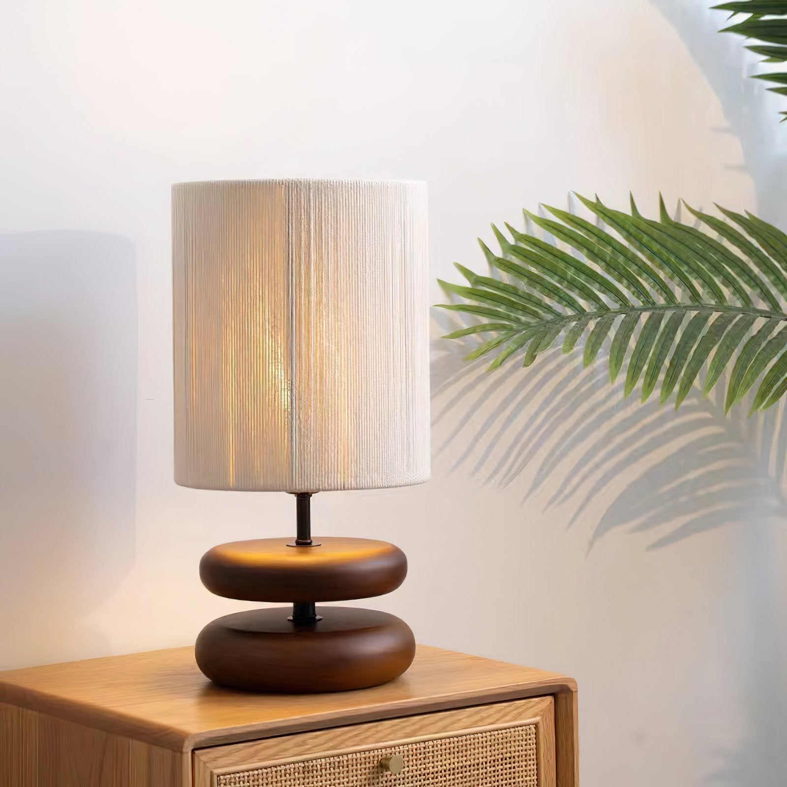 polished-walnut-stacked-oval-base-table-lamp-with-classic-beige-fabric-lampshade