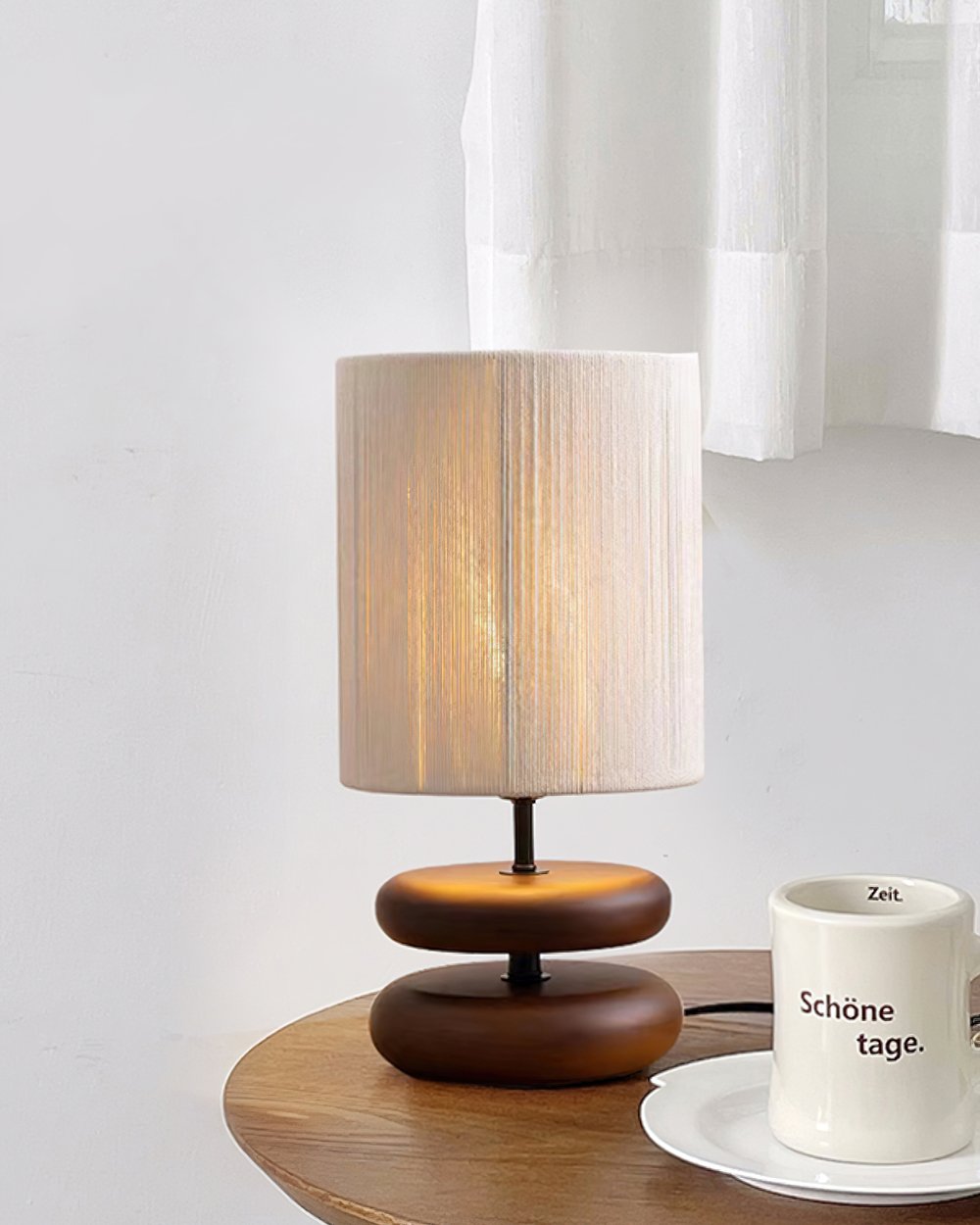 polished-walnut-stacked-oval-base-table-lamp-with-classic-beige-fabric-lampshade