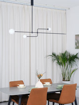 Modern Minimalist Linear Mobile Chandelier with Opal Glass Globes and Black Finish