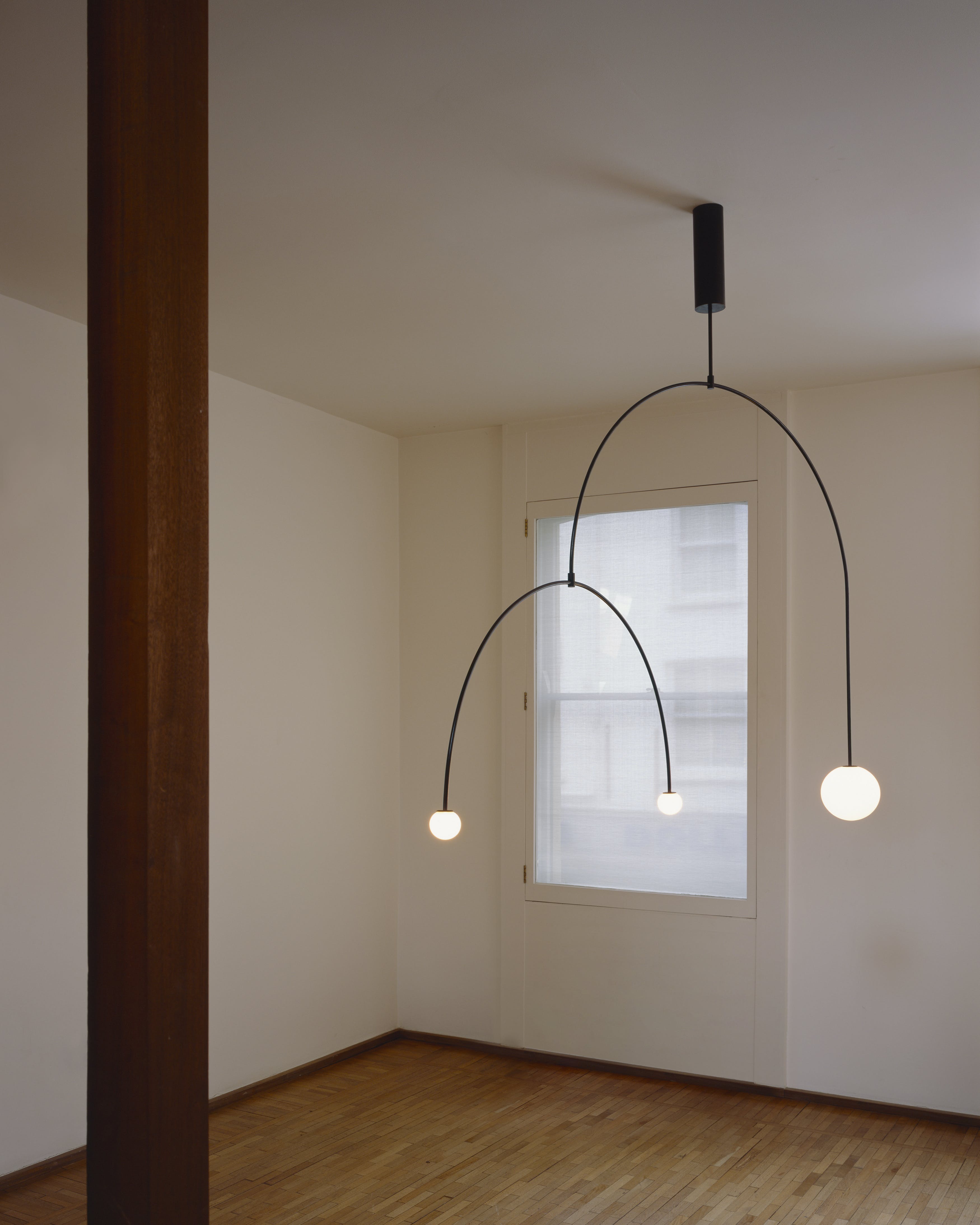 Modern Minimalist Linear Mobile Chandelier with Opal Glass Globes and Black Finish