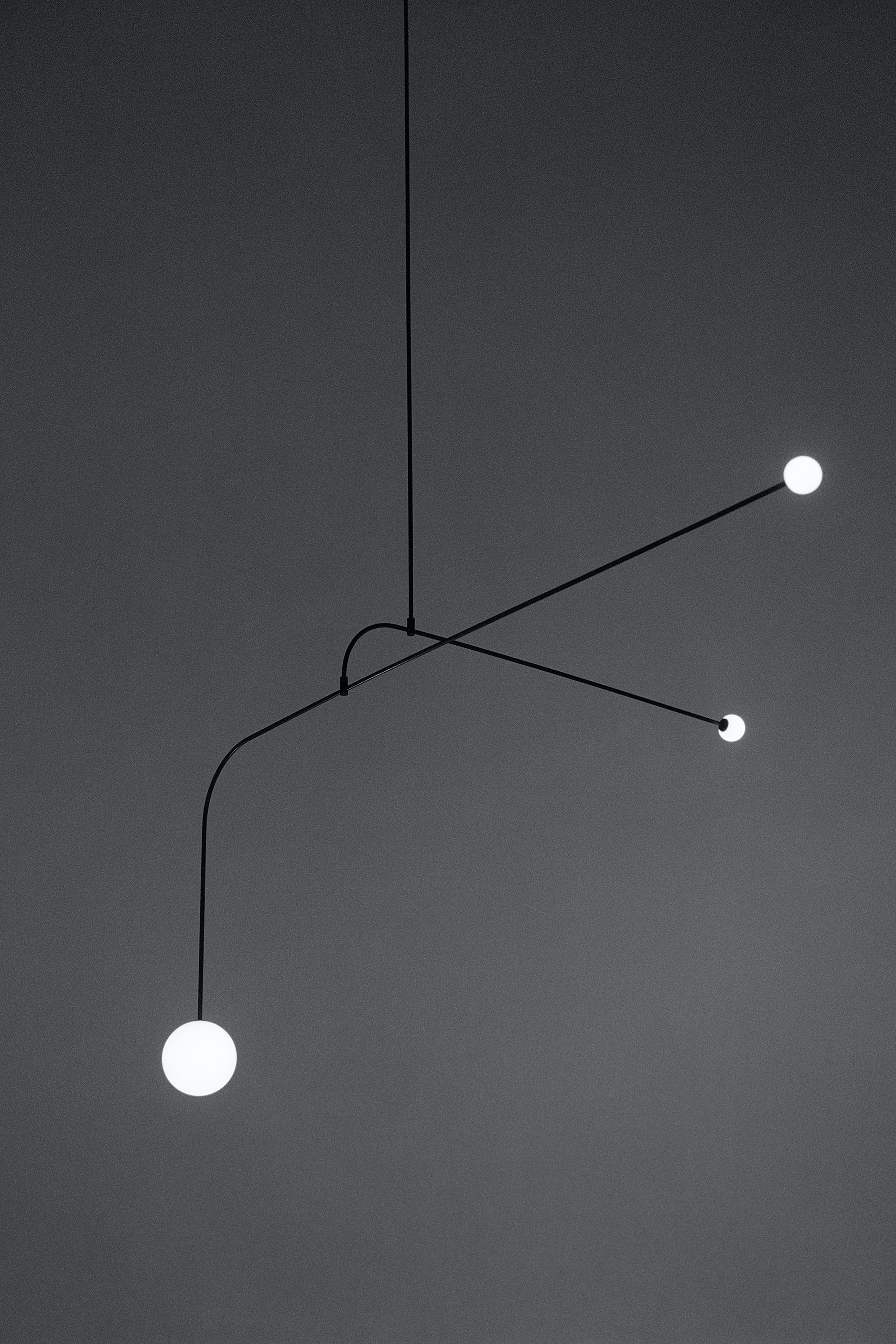 Modern Minimalist Linear Mobile Chandelier with Opal Glass Globes and Black Finish