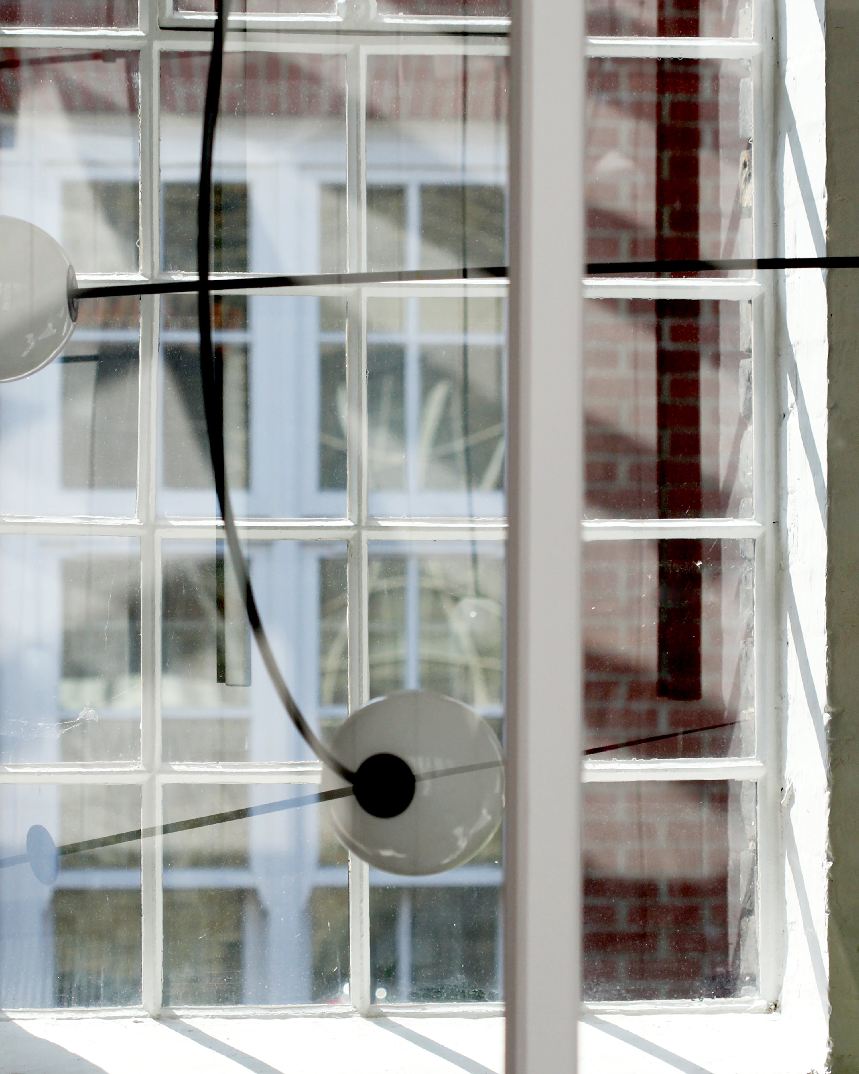 Modern Minimalist Linear Mobile Chandelier with Opal Glass Globes and Black Finish