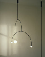 Modern Minimalist Linear Mobile Chandelier with Opal Glass Globes and Black Finish