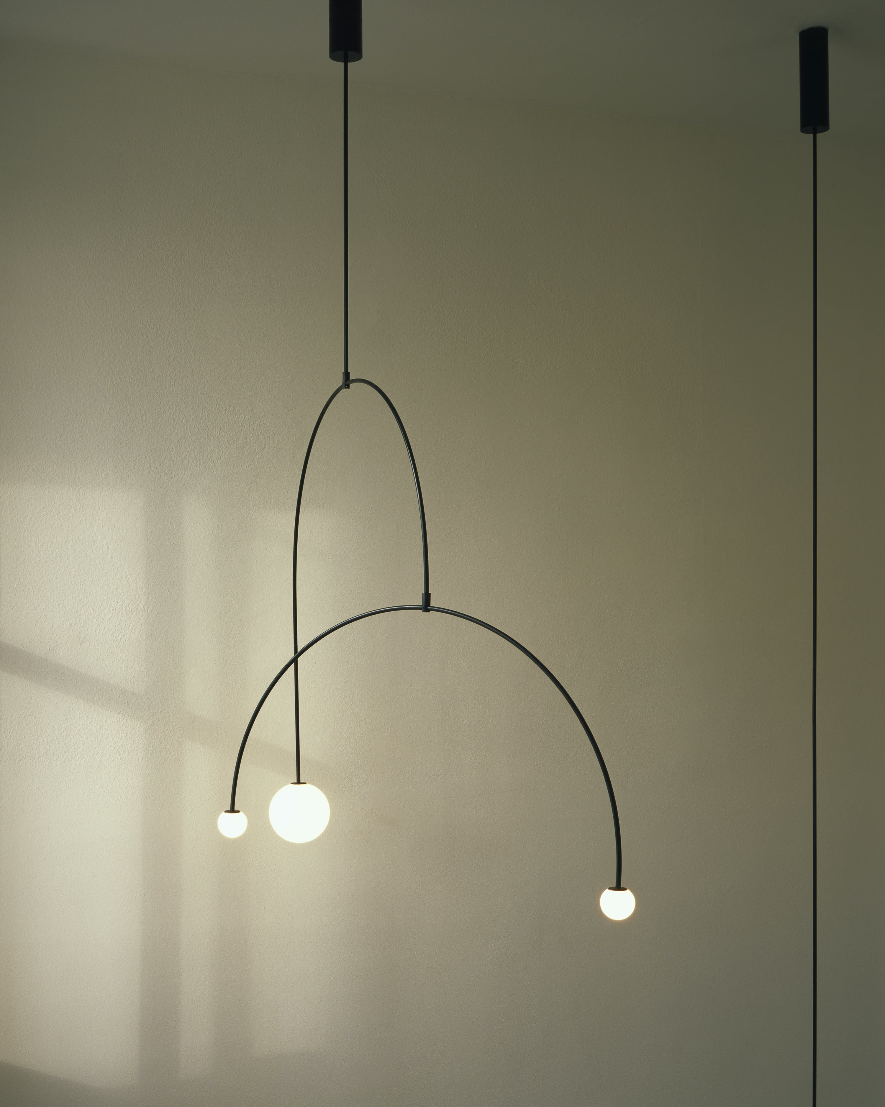 Modern Minimalist Linear Mobile Chandelier with Opal Glass Globes and Black Finish