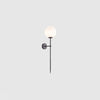 modern-brass-and-opal-glass-sphere-mobile-wall-sconce-lighting-for-indoor-spaces