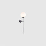 modern-brass-and-opal-glass-sphere-mobile-wall-sconce-lighting-for-indoor-spaces