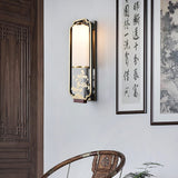 modern-chinese-wall-sconce-geometric-brass-and-white-glass-interior-accent-lighting