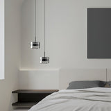 modern-brass-and-smoke-gray-glass-globe-led-pendant-light-for-living-room-and-bedroom