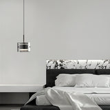 modern-brass-and-smoke-gray-glass-globe-led-pendant-light-for-living-room-and-bedroom