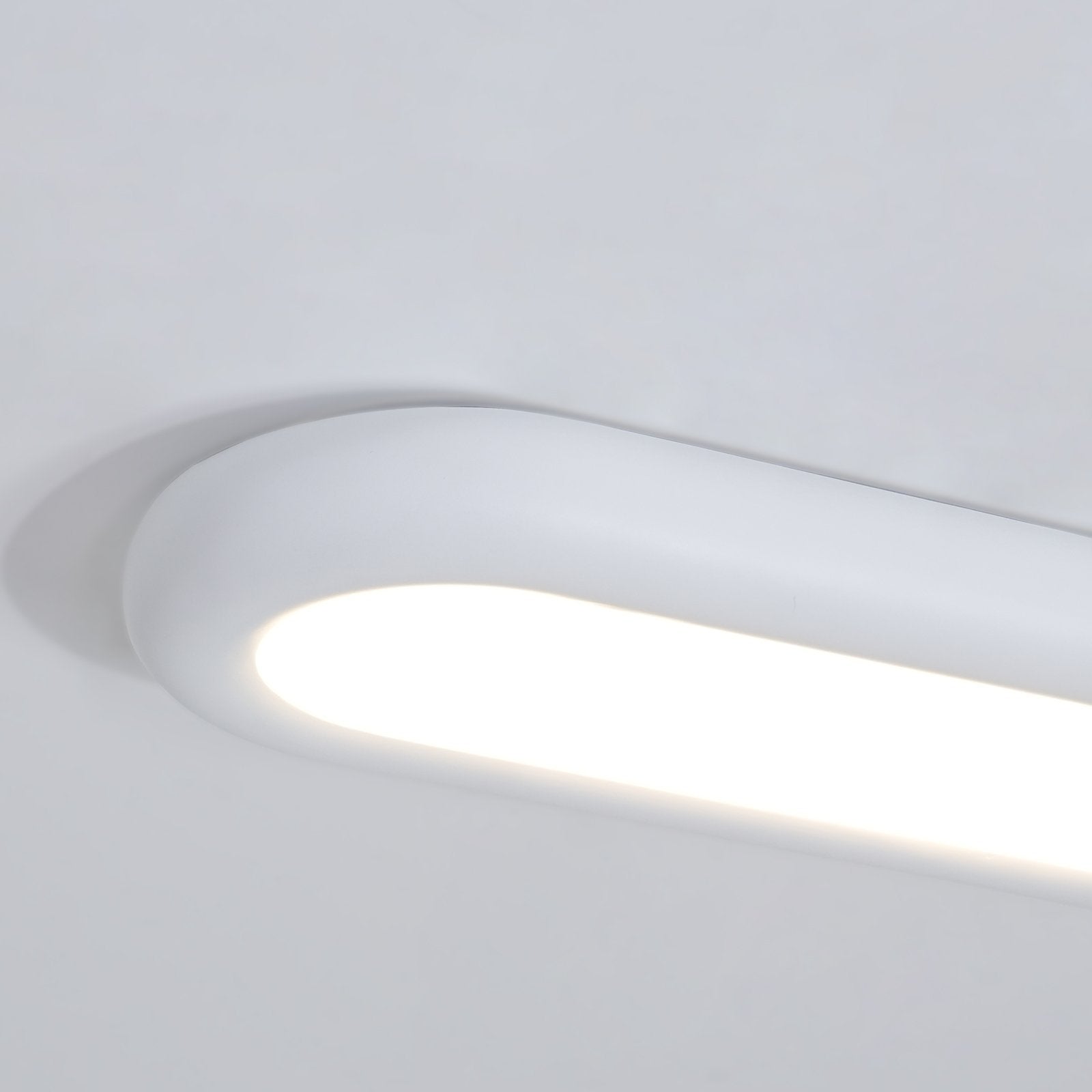 minimalist-oval-flush-mount-led-ceiling-light-fixture-with-three-color-temperatures