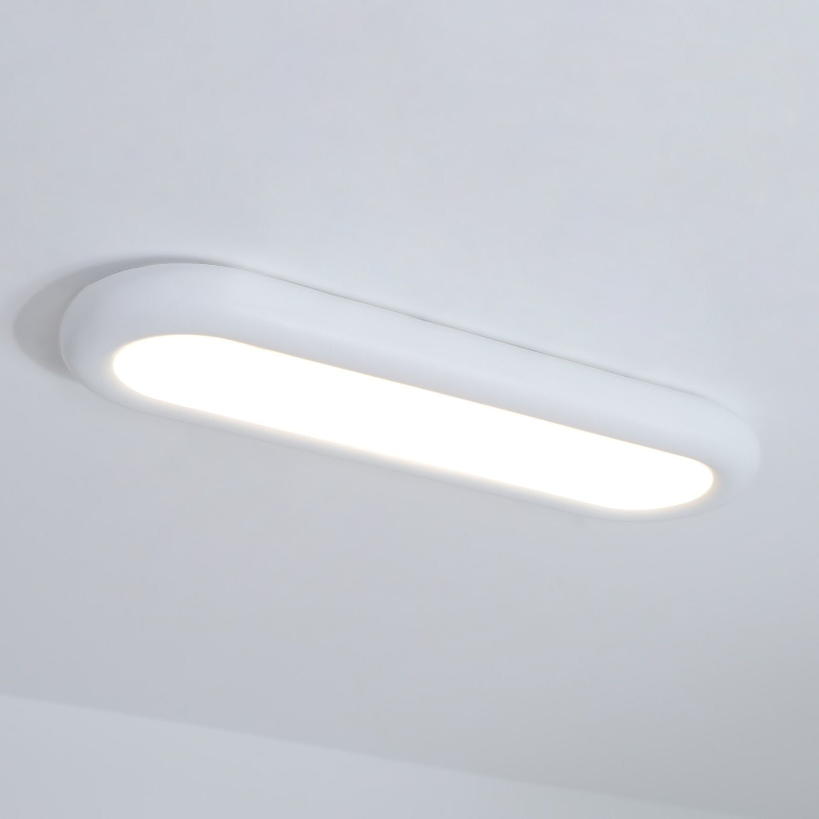 minimalist-oval-flush-mount-led-ceiling-light-fixture-with-three-color-temperatures
