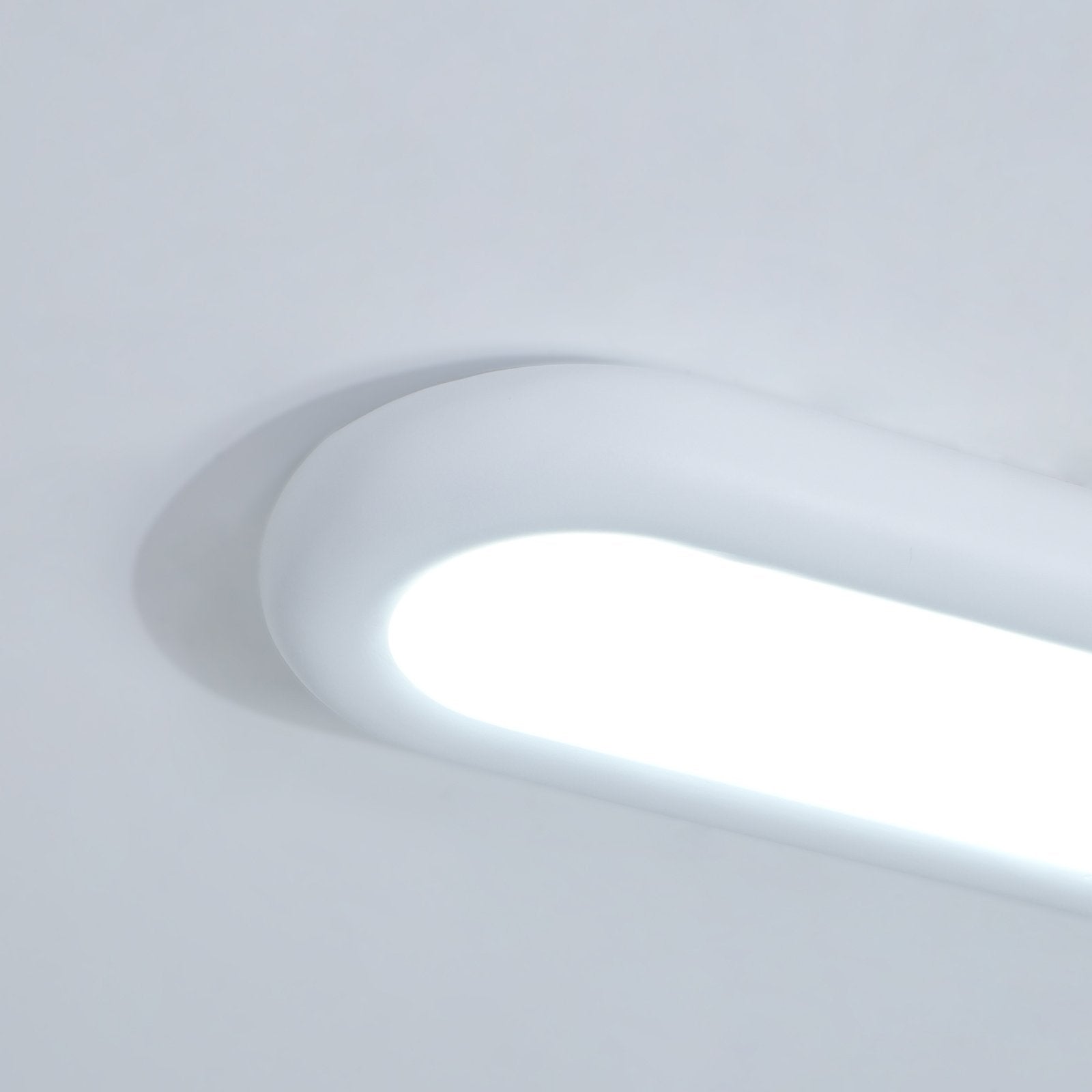 minimalist-oval-flush-mount-led-ceiling-light-fixture-with-three-color-temperatures