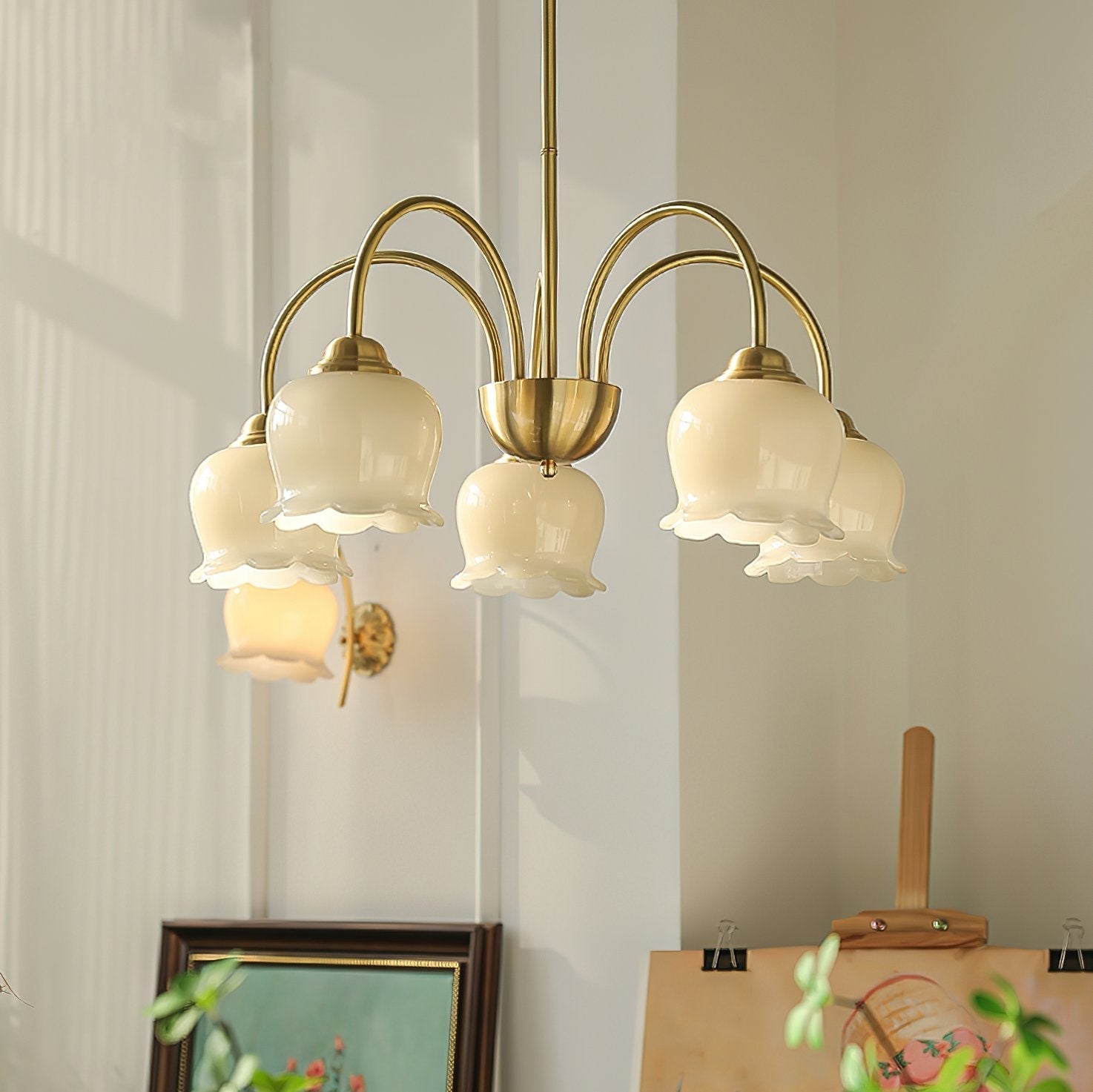 morup-elegant-floral-brass-and-resin-chandelier-with-shimmering-arches-and-cream-accents