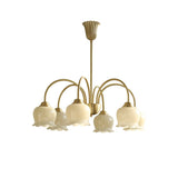 morup-elegant-floral-brass-and-resin-chandelier-with-shimmering-arches-and-cream-accents
