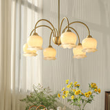 morup-elegant-floral-brass-and-resin-chandelier-with-shimmering-arches-and-cream-accents