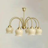 morup-elegant-floral-brass-and-resin-chandelier-with-shimmering-arches-and-cream-accents