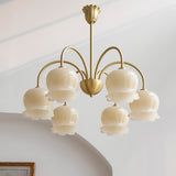 morup-elegant-floral-brass-and-resin-chandelier-with-shimmering-arches-and-cream-accents