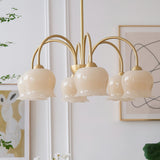 morup-elegant-floral-brass-and-resin-chandelier-with-shimmering-arches-and-cream-accents