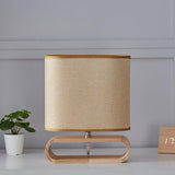 Moti Minimalist Natural Wood Table Lamp with Brown Fabric Shade for Bedside