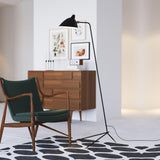 three-arm-rotating-floor-lamp-sculptural-standing-light-in-matte-black-metal