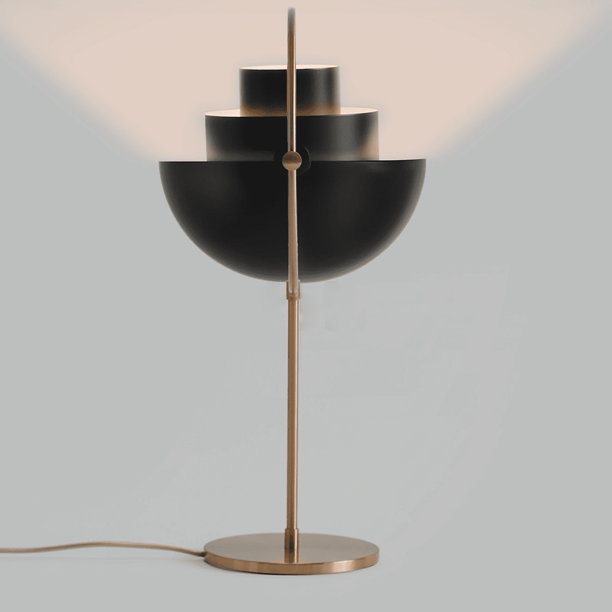 modern-sculptural-spherical-table-lamp-with-adjustable-metal-shades-and-copper-finish