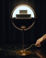 modern-sculptural-spherical-table-lamp-with-adjustable-metal-shades-and-copper-finish