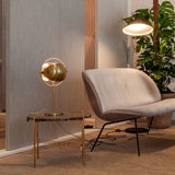modern-sculptural-spherical-table-lamp-with-adjustable-metal-shades-and-copper-finish