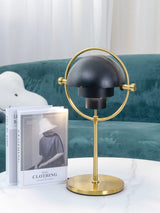 modern-sculptural-spherical-table-lamp-with-adjustable-metal-shades-and-copper-finish