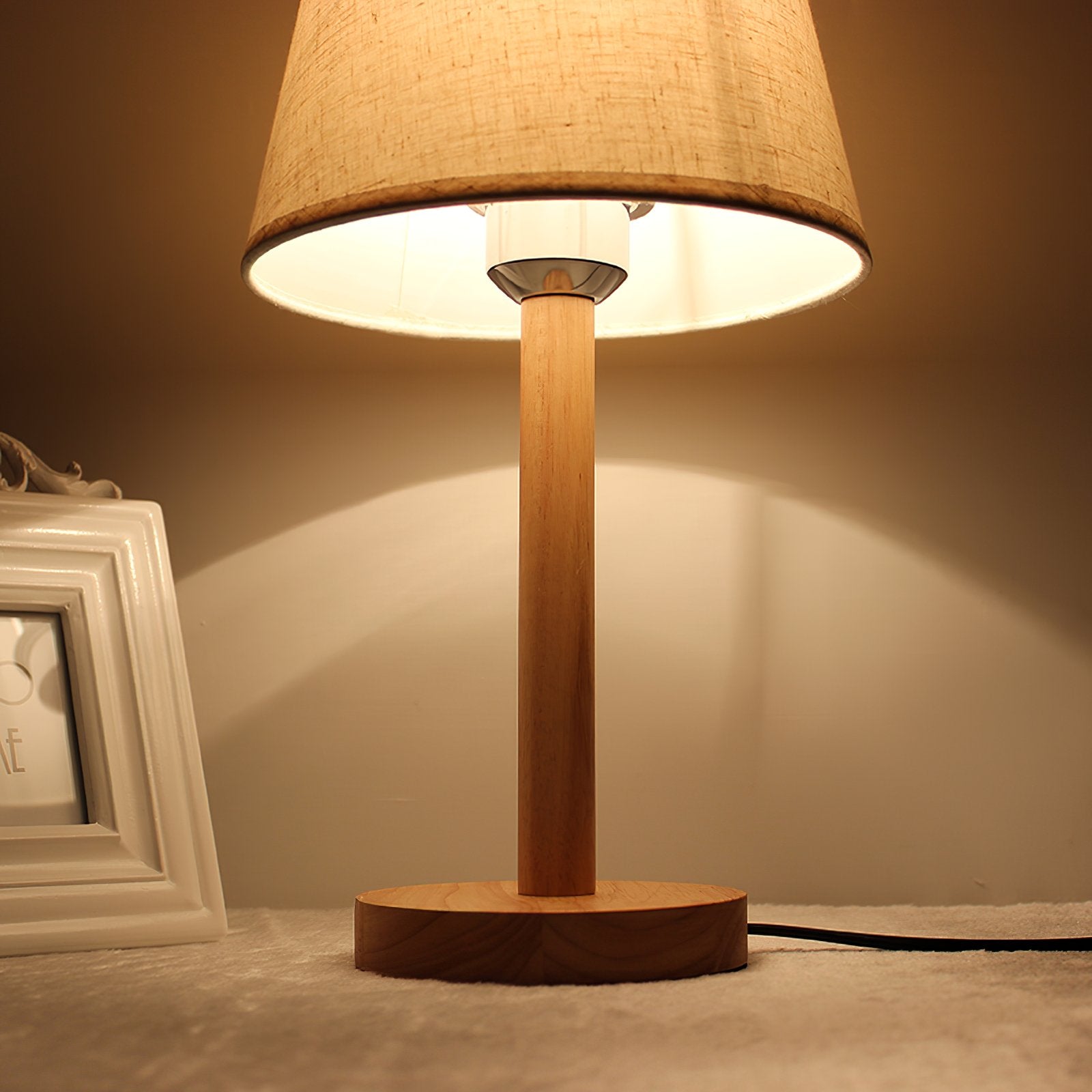 minimalist-nordic-wooden-bedside-lamp-with-white-fabric-drum-shade-for-modern-home
