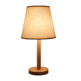 minimalist-nordic-wooden-bedside-lamp-with-white-fabric-drum-shade-for-modern-home