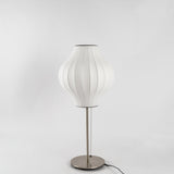 Modern Tripod Accent Table Lamp with White Polymer Bubble Shade for Elegant Interior Lighting