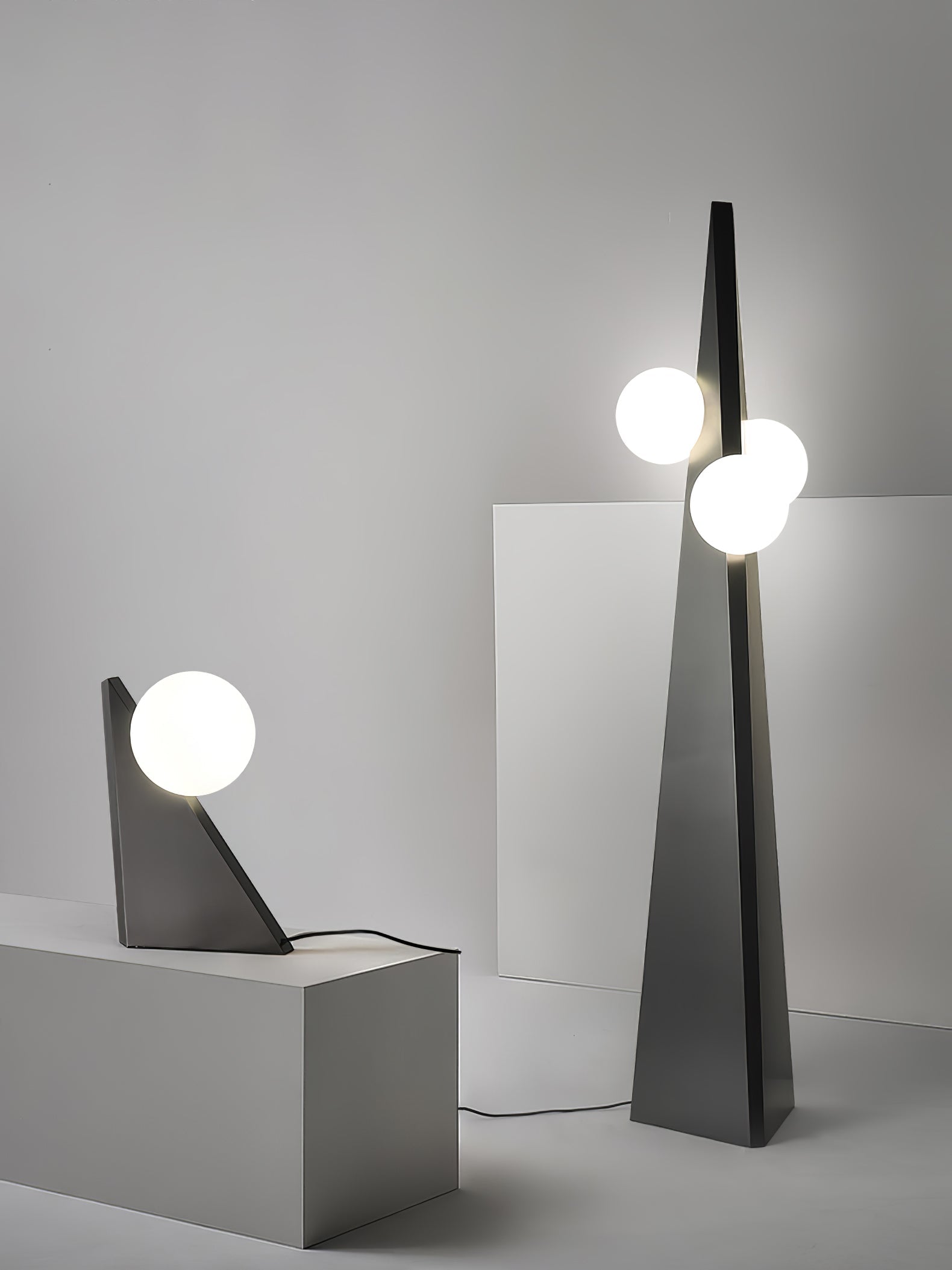 Geometric Stainless Steel Floor Lamp with Spherical Glass Shade in Black Finish